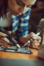 Image result for woman soldering