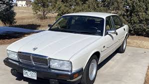 Image result for New Glacier White 1991 Jaguar