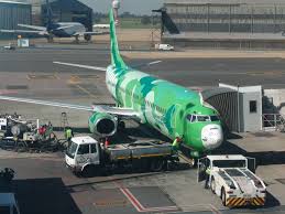 airplane touch down at airport/home