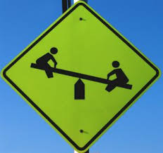 kids playing signs