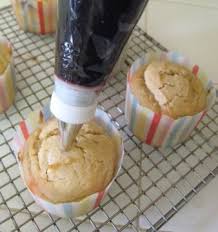 filling cupcakes