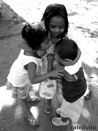 little kids hugging