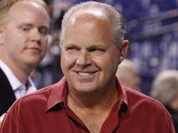 Rush Limbaugh smiles.