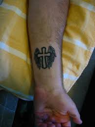 cross wrist tattoo