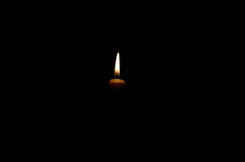 a candle in the dark