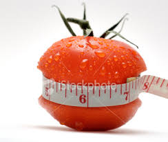 ريجيم متميز جدااااااااااا Ist2_1003789_concept_diet_weight_loss_tomato_with_waist_measured