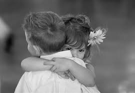 little kids hugging