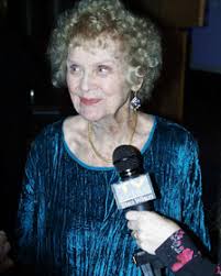 Gloria Stuart holding Award .