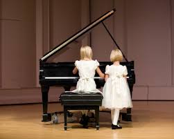children playing piano