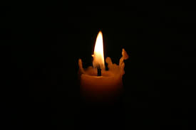 a candle in the dark
