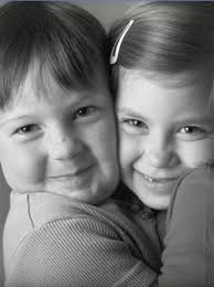 little kids hugging