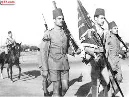 فى الليله دى  Nasser%2560s_carrying_a_flag_before1-1952