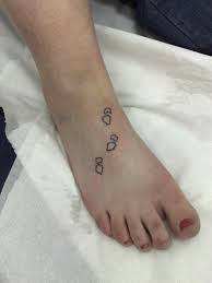 footprints tattoo