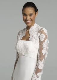 A (very early) dress dilemma :  wedding dress Images?q=tbn:i CYmzOq6Y ITM: