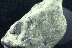 Magnesium iron silicate. Chrysopal, Glinkite, Hawaiite, Villarsite, Glinkita, Hawaiita. It is sometimes inaccurately referred to as forsterite. Forsterite is pure magnesium silicate. CAS# 1317-71-1