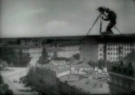 a man with a movie camera