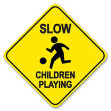 kids playing signs