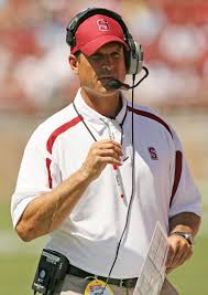 JIM HARBAUGH. Age: 45