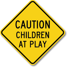 kids playing signs