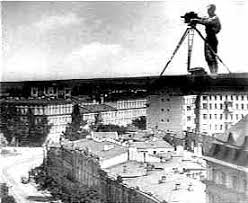 a man with a movie camera