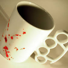 brass knuckles coffee cup