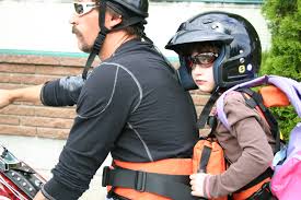 child riding belt