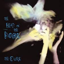 Cure - Head On The Door