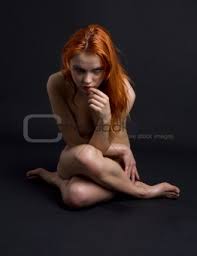 Mature redhead gets naughty with the mailman ...