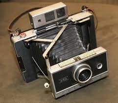 old school polaroid camera