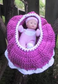 crocheted pattern baby in bassinet purse
