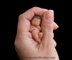 miniature baby doll