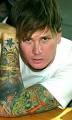 Tom Delonges Dense Sleeve Tattoo and Other Arm Blank | Celebrity.