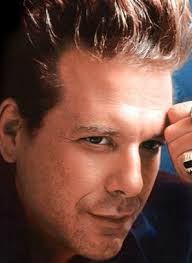 With quiet eyes beaming from beneath a pompadour that almost had a career of its own, Rourke shone in small establishing roles in the films Diner and Body ... - 6a00d83451e17769e201053587c25c970c-320wi