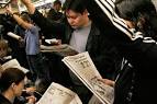 File:NYC subway riders with their newspapers.jpg - Wikipedia, the ...