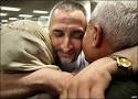 Palestinian-born Bulgarian doctor Ashraf Ahmad Juma Hajuj hugs his mother ... - _44024950_05doctor_afp