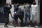 Brazil violence: Police storm a heavily-fortified slum in hunt for ...