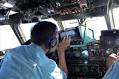 Malaysia military tracked missing plane to west coast: source.