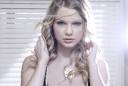 Penyanyi Taylor Swift, 21, gemar membuat tato temporer. - 205302_778454_taylor_swift
