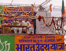 Deputy Prime Minister L.K. Advani addresses a public meeting during the Bharat Uday Yatra at Sonepat on Wednesday. — Photo by Neeraj Chopra - id5