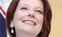 Julia Gillard believes that Australia needs a carbon tax to combat global ... - Julia-Gillard-006