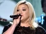 Kelly Clarkson enlists adorable baby River to help tease her new.