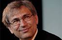 Orhan Pamuk, smiling and relaxed on stage at Hay. Photograph: Martin Godwin - pamuk460