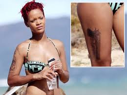 Rihanna's tattoos Images?q=tbn:ANd9GcRJwgXzZXdmrQVZthIJcLyqOHX4sBaDU2bcEPa5dRnHHRV5iHItBA