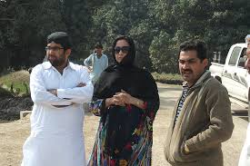 Madam Rahila Gul Magsi is visiting her Agriculture fields with Mr. Mohsin (Son), and Mr. Shabir Shah (Technical Advisor) is explaining her about the Ring ... - 4308007999_4c18563ae6_z