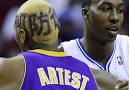 RON ARTEST's new hairstyle proves he has defense on the mind ...