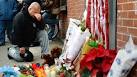 NYPD officer laid to rest after tender, tense funeral - CNN.