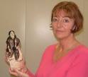 Liz Hinds holding the Indian doll she believed her father bought for her - ds_gal_liz