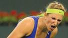 ... survived an opening-match scare to beat Mona Barthel 6-4, 6-7 (4/7), ... - tennis_01_temp-1331456061-4f5c683d-620x348
