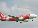 AirAsia live: Emergency slide, plane door seen in search for.