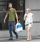 Dakota Fanning dresses down for daytime date with hunky male